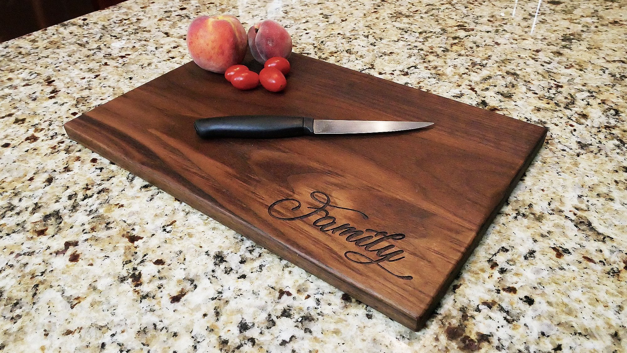 https://www.haileyhome.com/cdn/shop/products/family-custom-engraved-walnut-cutting-board-11-x-16-689476_1024x1024@2x.jpg?v=1628782908